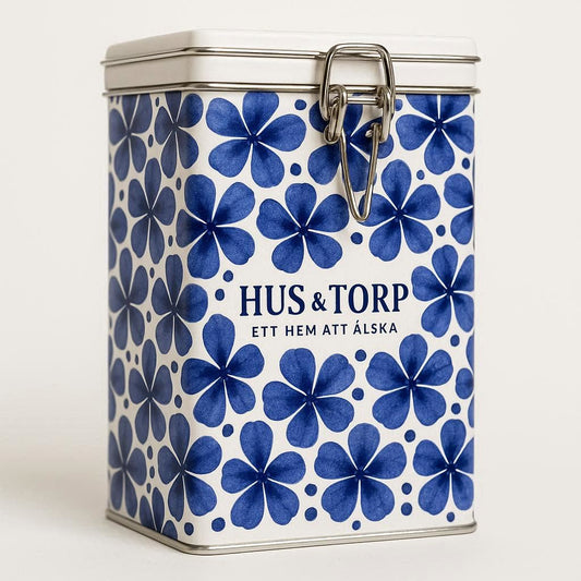 hus och torp zoega burk med möster av blå blommor och vit motiv